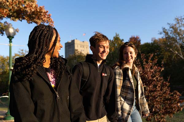 Smiling students enjoying the Indiana University campus