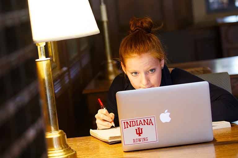 Student working on her computer