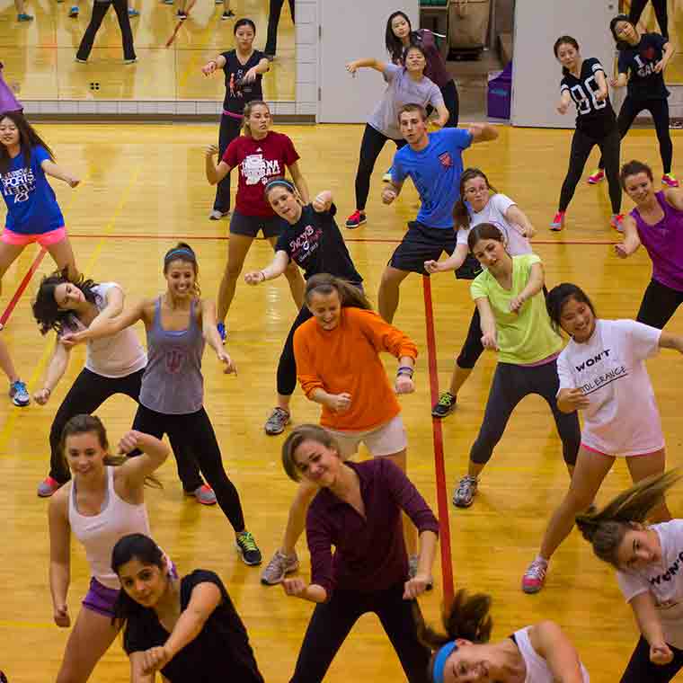 Students take part in group exercise.