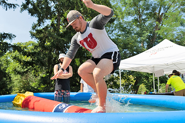 Students enjoying orientation event water activities